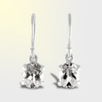 Starborn Danburite Faceted Oval Prong Set Dangle Earrings in Sterling Silver