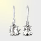 Starborn Danburite Faceted Oval Prong Set Dangle Earrings in Sterling Silver