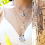 Starborn Elegant Scroll Rutilated Quartz Pendant in Sterling Silver
